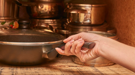 hands of baker kneading dough