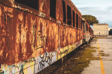 Fototapeta na wymiar MANDURIA-ITALY/DECEMBER 2017: Abandoned train