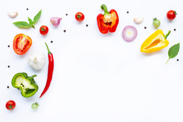 Various fresh vegetables and herbs on white. Healthy eating concept