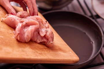 Fresh Raw chicken on wood cutting board