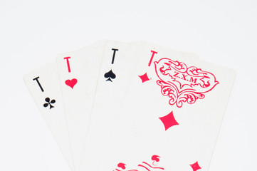 Playing cards on white background, copy space for text.
