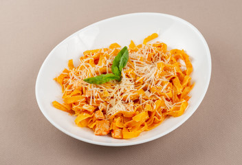 pasta with cheese in a white plate