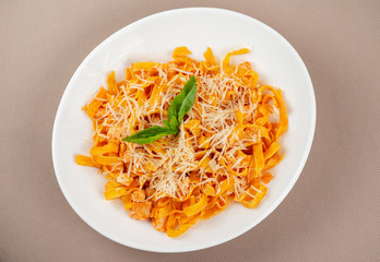pasta with cheese in a white plate