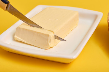 Sliced boiled sausage with bread, butter