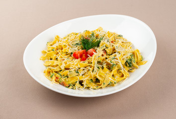 pasta with cheese in a white plate