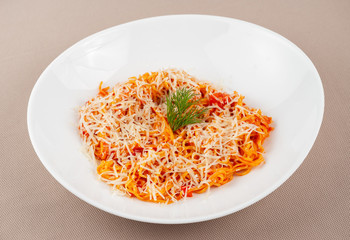 pasta with cheese in a white plate