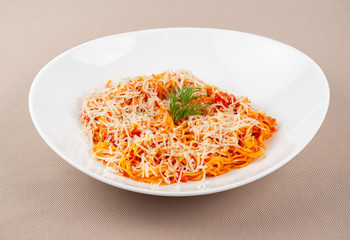pasta with cheese in a white plate