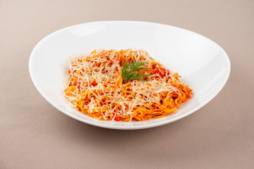 pasta with cheese in a white plate