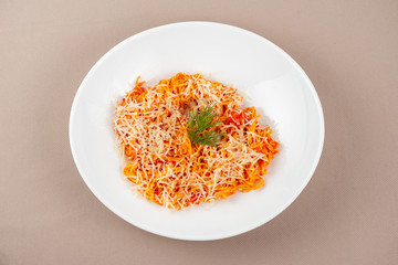pasta with cheese in a white plate