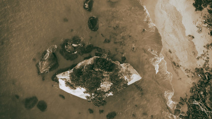 Cathedral Cove coastline at sunset. Amazing overhead aerial view from drone