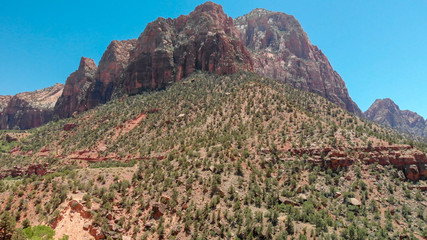 Zion National Park in summer season. Red mountains against blue sky