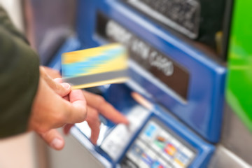 Man recharges card at the machine