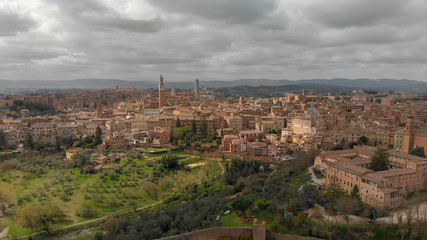 Fototapeta na wymiar Siena, Tuscany. Beautiful aerial city skyline from surrounding hills