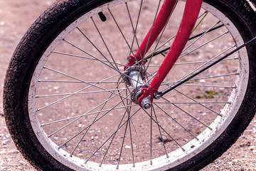 black bicycle wheel on the ground
