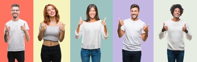 Composition of african american, hispanic and chinese group of people over vintage color background success sign doing positive gesture with hand, thumbs up smiling and happy. Looking at the camera