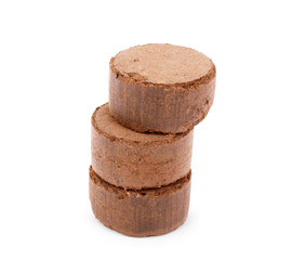 seedling pills on white background, gardening concept