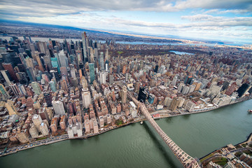 Naklejka premium Wide angle aerial view of Midtown Manhattan and Central Park from helicopter, New York City
