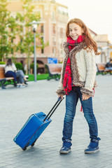 Adorable young tourist girl travelling