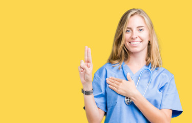 Beautiful young doctor woman wearing medical uniform over isolated background Swearing with hand on chest and fingers, making a loyalty promise oath
