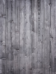 grey brown part of planks on wooden shed or barn