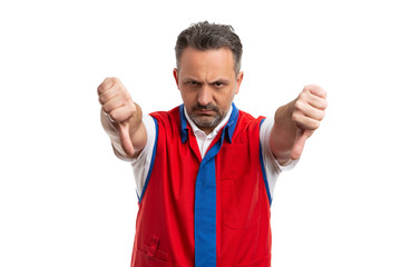Naklejka premium Hypermarket employee holding double thumbs down.