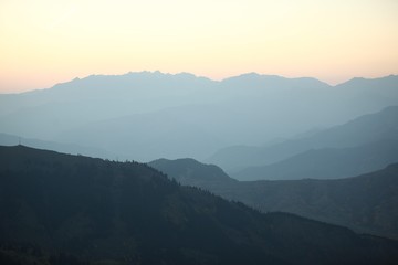 Fototapeta premium Green mountains in the fog. Seamless background. savsat/artvin/turkey
