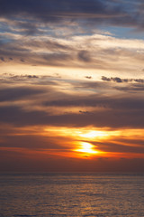 sunrise at ocean seascape with reflection