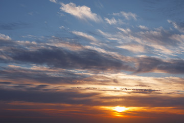 Naklejka na ściany i meble cloudscape sunrise, blue sky background