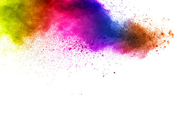 Colorful powder explosion on white background. Abstract pastel color dust particles splash.