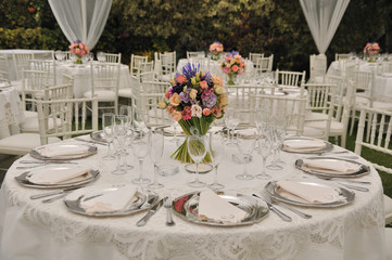 decoration of marriage table, flowers and glasses