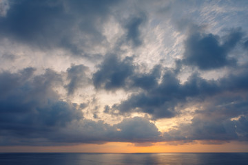 Naklejka na ściany i meble cloudscape above the ocean seascape with reflection