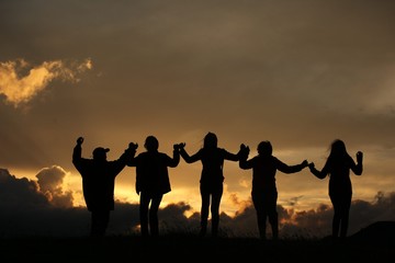 Fototapeta premium group of happy young people dancing at the beach on beautiful summer sunset .savsat/artvin/turkey