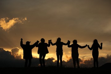 group of happy young people dancing at the beach on beautiful summer sunset .savsat/artvin/turkey