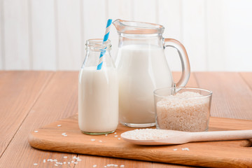 Bottle and jug of milk