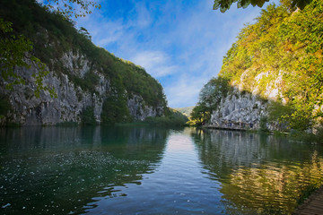 Fototapeta na wymiar Beautiful lake with the blue water between green hills. Plitvice Lakes, Croatia.