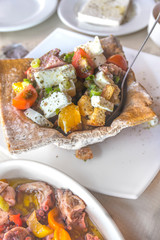 Orange and cheese salad in a bread made pot