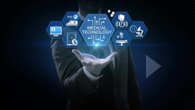 Businessman opens palm, 'MEDICAL TECHNOLOGY' and various future medical vector icon in hexagon, 4k animation.