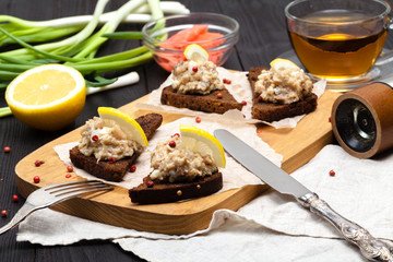 minced herring fillet with apple and egg on toasted rye bread, homemade traditional Jewish cuisine dish forshmak, snack or appetizer