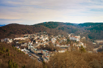 Karlovy Vary, Czech Republic - March 04, 2019: Mountains and city view from the top