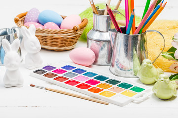 Kid workplace for paint Easter eggs