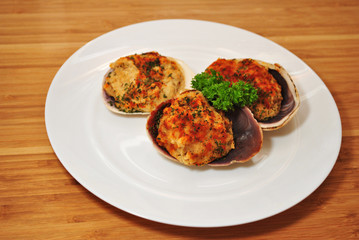 Appetizer of Stuffed Clams Garnished with Curly Parsley