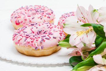Fresh donut served with a cup of coffee