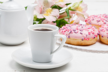Coffee with glazed donuts, light breakfast snack