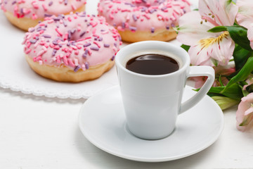 Coffee for breakfast with glazed donuts