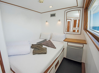 Cabin in a luxury private motor yacht