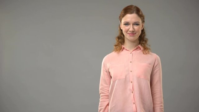 Deaf female asking sign slow please in asl, teacher showing words tutorial