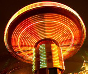 The lights on the carousel in motion
