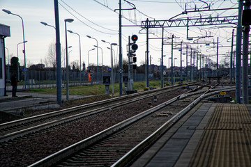 Empty train station, and deserted platform.