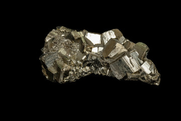 Macro mineral stone Pyrite on a black background