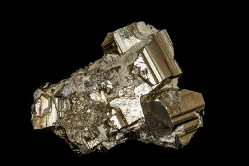 Macro mineral stone Pyrite on a black background